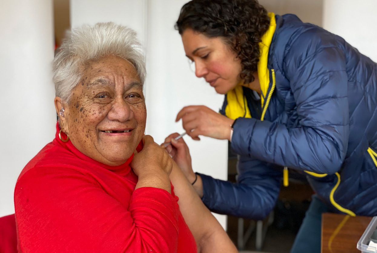 Dr Maia Melbourne-Wilcox administering a vaccine at Rehua Marae