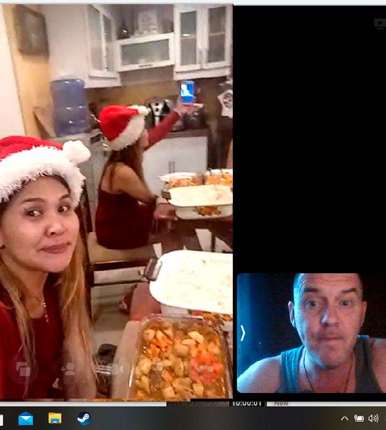 Alistair and Briely share Christmas dinner, approximately 8,000 kilometres apart.