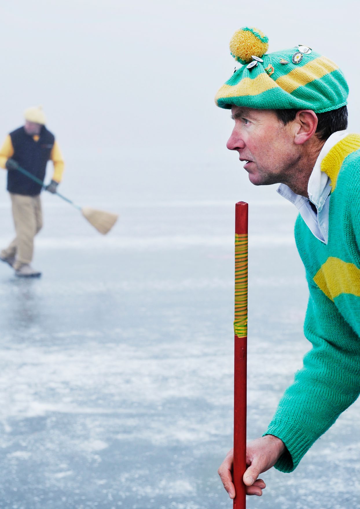 A member of the Poolburn Curling Club directs a teammate’s throw during the 2010 Bonspiel on the Idaburn Dam.