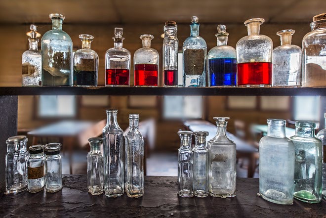These bottles once held chemicals such as hydrochloric acid, mercury and ammonium persulphate for analysis of different chemicals, removed for health and safety purposes.
