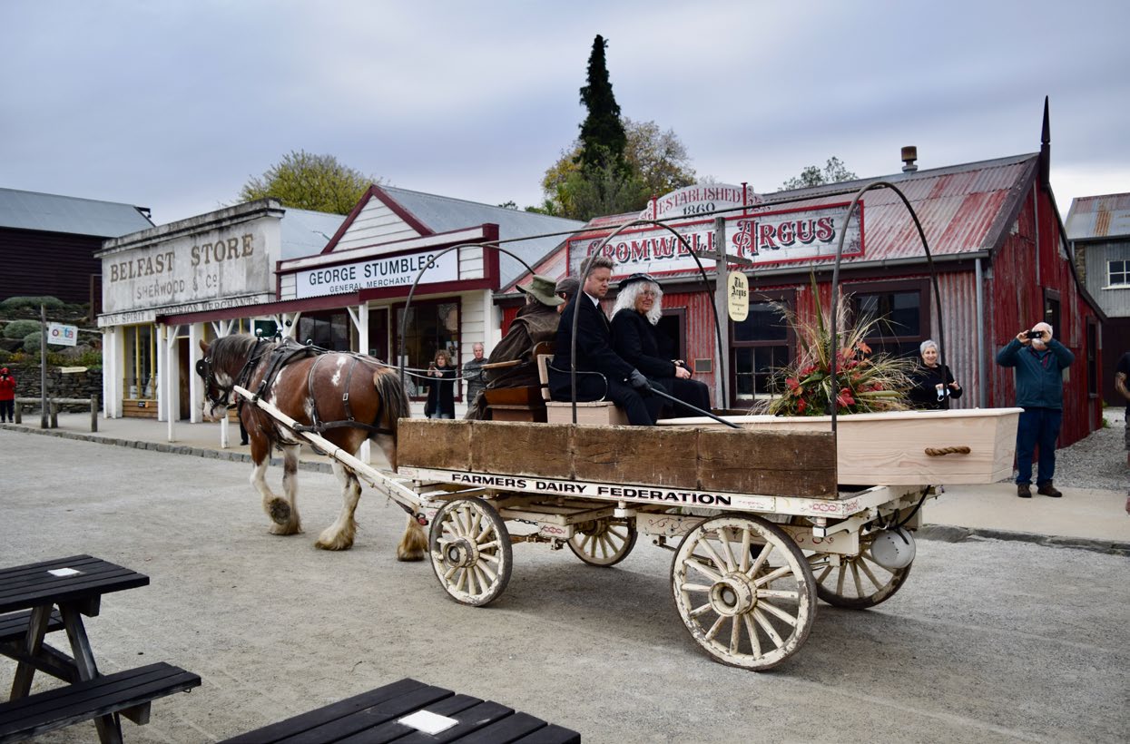 The coffin of the unknown gold miner was drawn in a horse and cart through Old Cromwell.